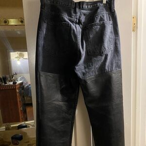 Top black denim bottom leather jeans